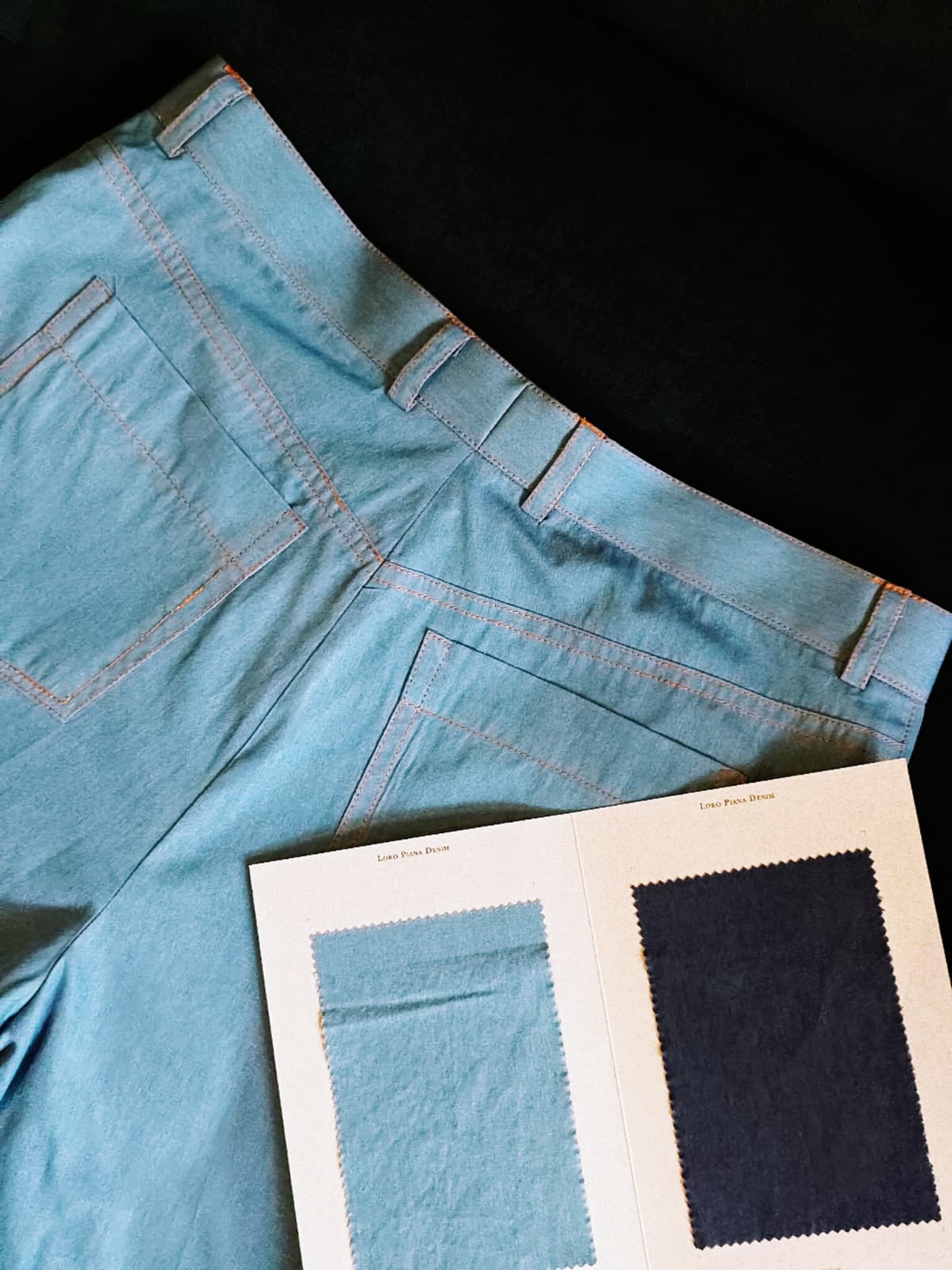 Stylish Light Blue Denim Trousers with Classic Bronze Stitching
